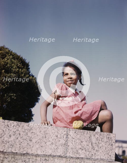 Little girl in a park near Union Station, Washington, D.C., ca. 1943. Creator: Unknown.