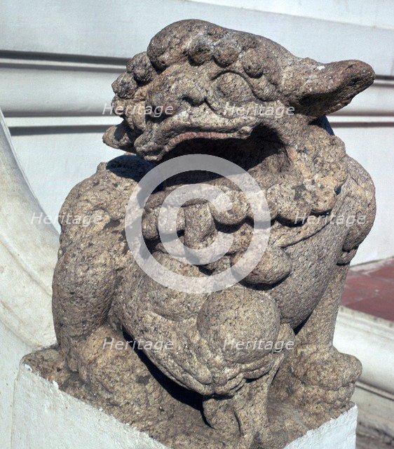 Lion guardian on the steps of a Buddhist temple. Artist: Unknown