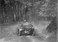 1496 cc Singer competing in the B&HMC Brighton-Beer Trial, Fingle Bridge Hill, Devon, 1934. Artist: Bill Brunell.