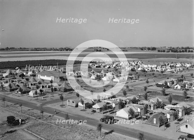 Farm Security Administration camp for migrant agricultural workers at Shafter, California, 1938. Creator: Dorothea Lange.