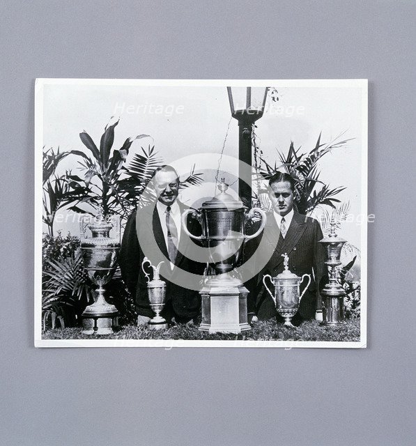 Bobby Jones with Grand Slam trophies, c1930. Artist: Unknown