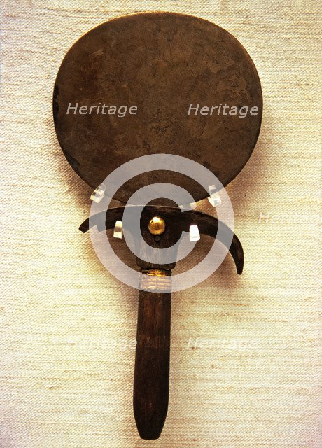 Bronze Mirror with a papyrus handle.