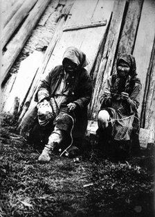 Tutur Tungus. Dudovka camp. Old women twist threads from deer tendons, 1920-1939. Creator: Unknown.
