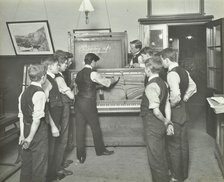 Constructing a piano, Benthal Road Evening Institute, London, 1914. Artist: Unknown.