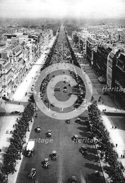 View of the Avenue des Champs Elysees, Paris, 1931.Artist: Ernest Flammarion