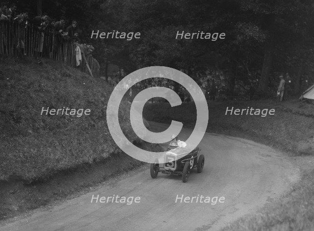 Austin Ulster TT type competing in the MAC Shelsley Walsh Speed Hill Climb, Worcestershire, 1935. Artist: Bill Brunell.