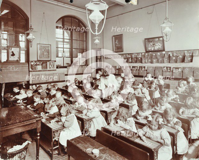 Writing lesson, Hugh Myddelton School, Finsbury, London, 1906. Artist: Unknown.