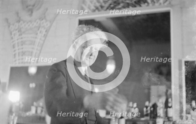 Arnold Genthe at a party, restaurant, or nightclub, between 1911 and 1942. Creator: Arnold Genthe.