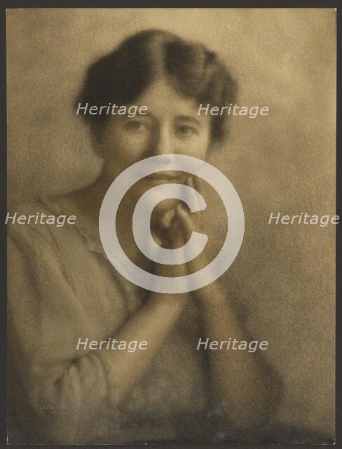 Portrait of a Woman with Hands Clasped at Face, 1907-1924. Creator: Louis Fleckenstein.