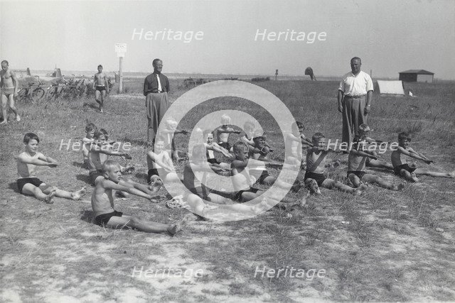 Boys doing exercises before having a swimming lesson, Sweden, 1939. Artist: Otto Ohm