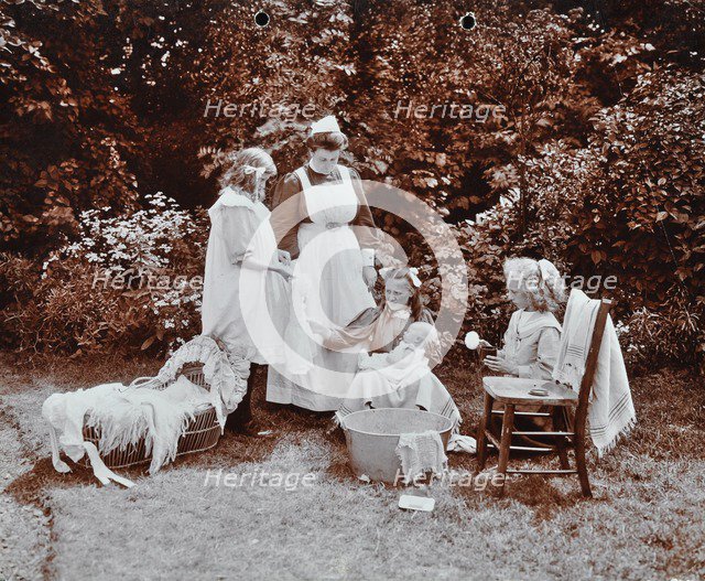 Girls learning infant care, Birley House Open Air School, Forest Hill, London, 1908. Artist: Unknown.