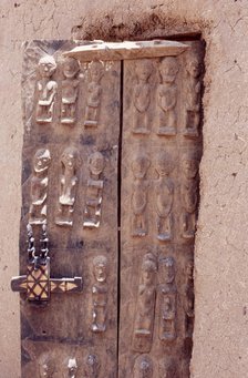 Carved wooden door, Pays Dogon, Mali, 1990. Creator: Amanda Waite.