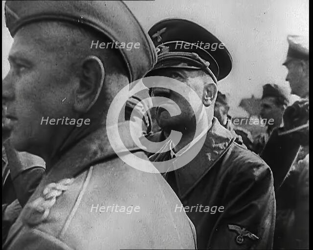 Adolf Hitler Standing With a Group of Other Male German Military Commanders, 1939. Creator: British Pathe Ltd.