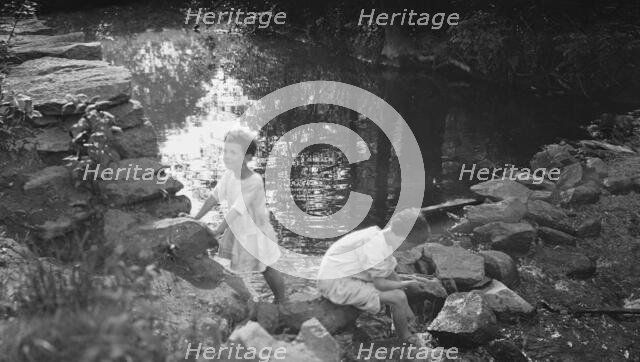 Kennerley, Richard and Morley, playing by a pond, 1912 or 1913. Creator: Arnold Genthe.