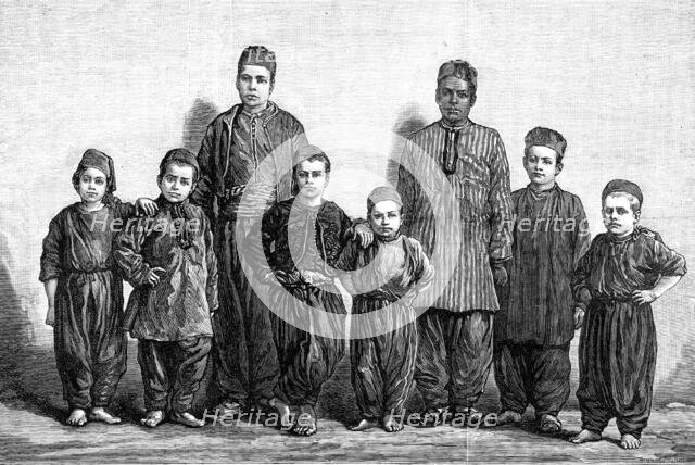 English acrobat boys detained by an Arab company in Constantinople, 1881. Creator: R&E Taylor.
