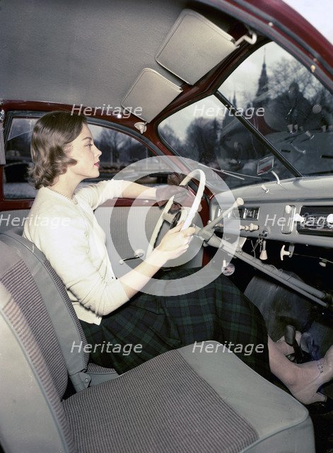 A woman in a Saab 92 car, Sweden, 1952-1953. Artist: Göran Algård