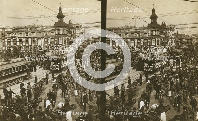 Crowds on a Tokyo street, near the train station(?), during the celebration of Admiral..., c1905. Creator: Underwood & Underwood.