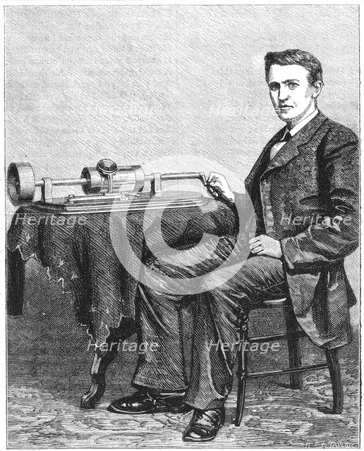 Thomas Alva Edison, American inventor, with an early hand-driven model of his phonograph, 1878. Artist: Unknown