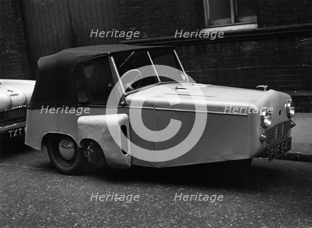 1956 Gordon 3 wheeler parked in street. Creator: Unknown.
