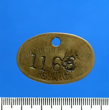 Maritime Colliery, lamp check (brass), c1890-1910. Creator: Unknown.