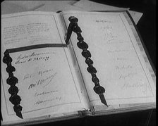 The Kellogg Briand Pact Book with Signatures, 1929. Creator: British Pathe Ltd.
