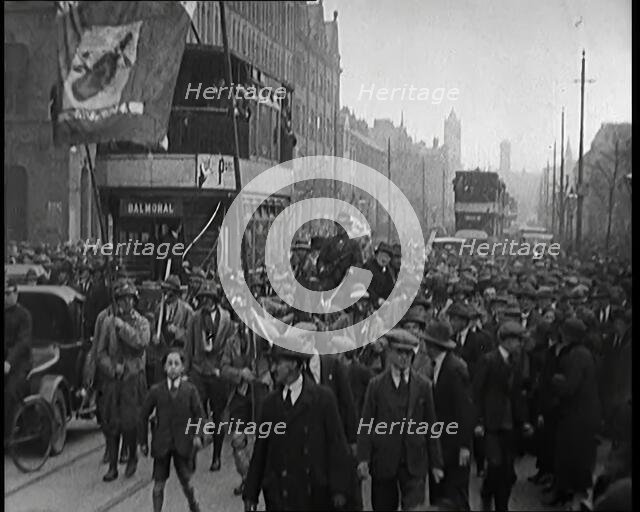 Winston Churchill, Chancellor of the Exchequer, Being Taken Through Crowd Filled Streets on..., 1926 Creator: British Pathe Ltd.