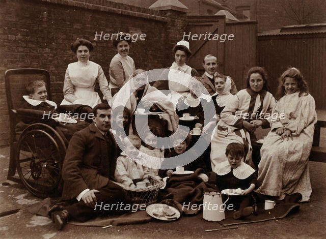 St Mary's Hospital, Plaistow: Basil Hood and Robert Archibald with patients and nurses..., 1904. Creator: Unknown.