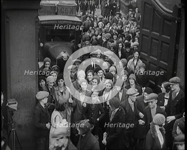 A Large Group of Workers Returning to the Factories, 1926. Creator: British Pathe Ltd.