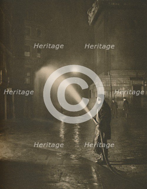 'London's Nightly Cleaning: Scene at the Base of the Monument', c1935. Creator: Unknown.