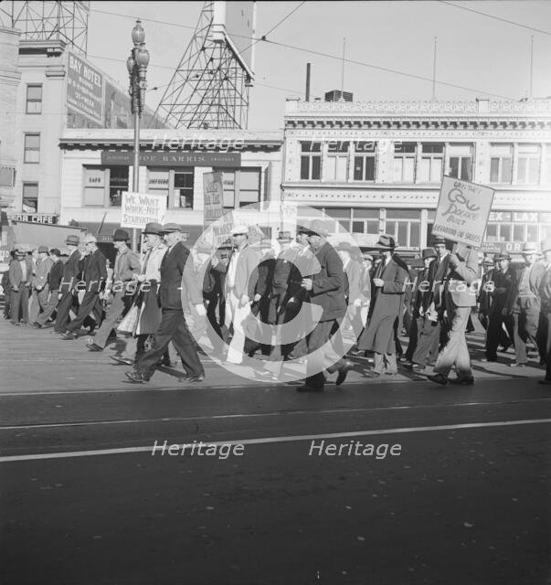 Mass meeting of WPA workers parading up Market Street, San Francisco, California , 1939. Creator: Dorothea Lange.