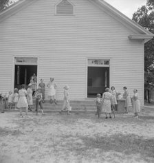 Possibly: Services are over, Wheeley's Church, Gordonton, Person County, North Carolina, 1939. Creator: Dorothea Lange.
