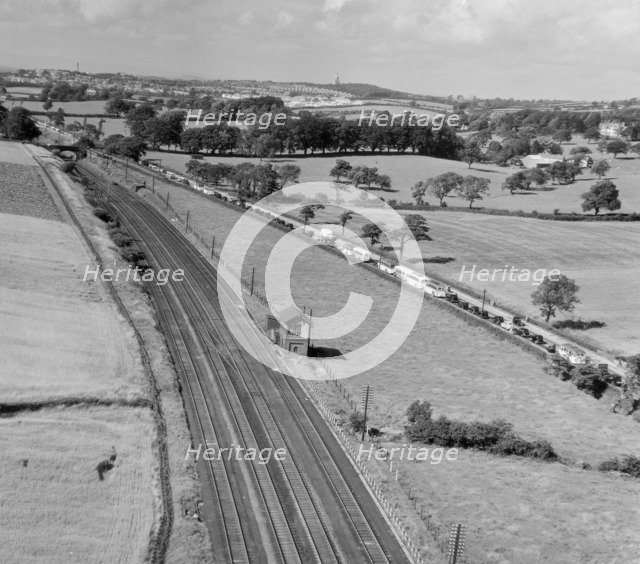 Traffic jam on the Preston-Lancaster Road, Lancashire, July 1951. Artist: Aeropictorial Ltd.