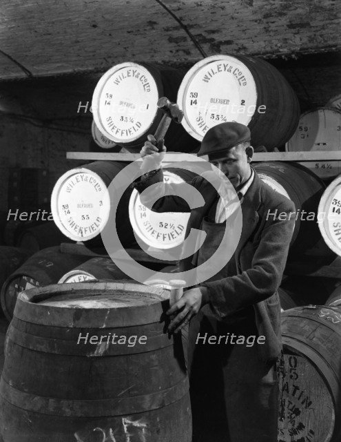 Coopering, making whiskey barrels at Wiley & Co, Sheffield, South Yorkshire, 1961.  Artist: Michael Walters