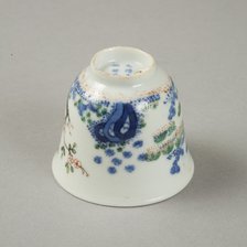 Underglaze blue month cup with polychrome enamelled decoration of a prunus tree. Artist: Unknown.