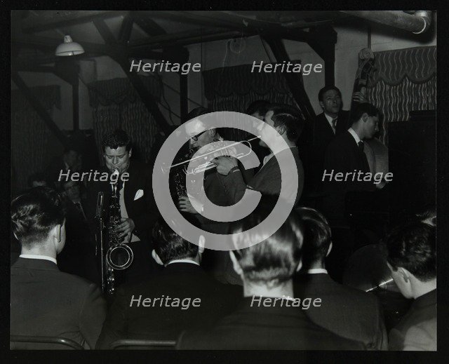 The Tubby Hayes Sextet playing at a modern jazz night at the Civic Restaurant, Bristol, 1955. Artist: Denis Williams