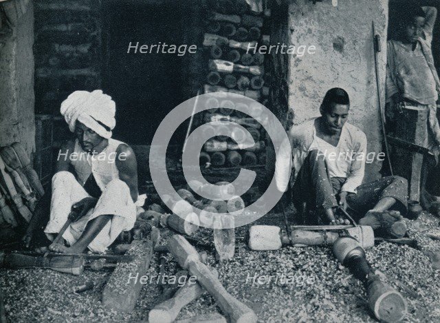 'Turning wooden bed legs', c1942. Artist: Unknown.