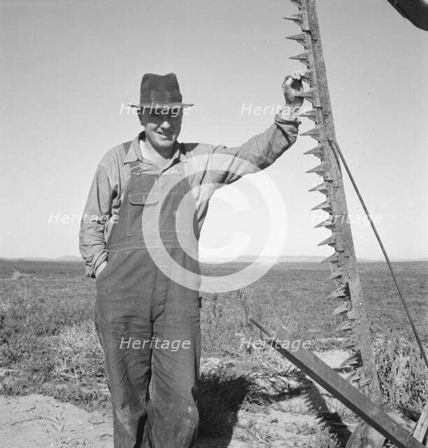 Farmer in his field getting ready to mow hay, Dead Ox Flat, Oregon, 1939. Creator: Dorothea Lange.