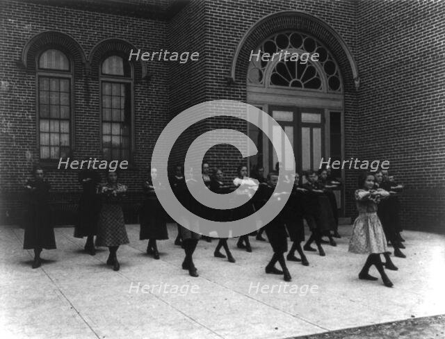 Calisthenics or dance class, outdoors, 3rd Division, (1899?). Creator: Frances Benjamin Johnston.