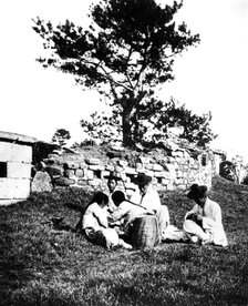 Family enjoying a picnic, Korea, 1900. Artist: Unknown