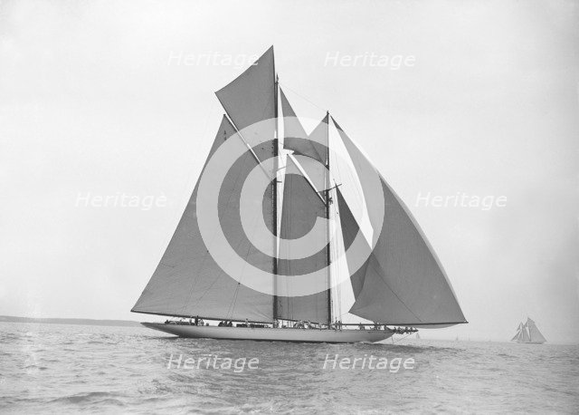 The 380 ton A Class schooner 'Margherita' sailing under spinnaker, 1913. Creator: Kirk & Sons of Cowes.