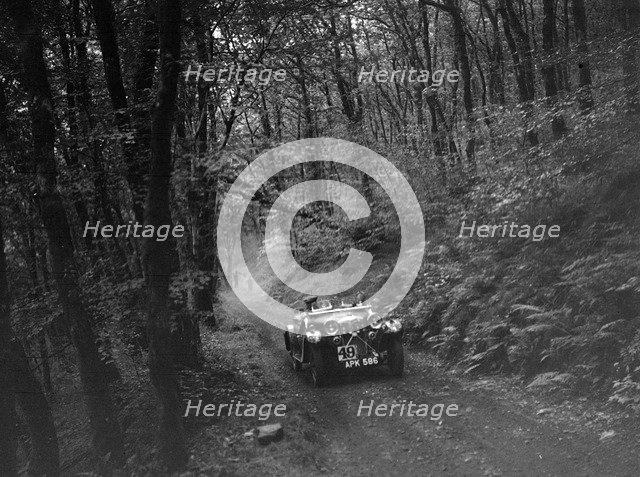 Riley Lynx competing in the Mid Surrey AC Barnstaple Trial, 1934. Artist: Bill Brunell.