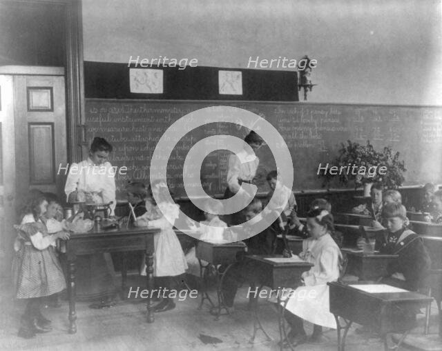 Washington, D.C. public schools, 1st Division - class studying thermometers, (1899?). Creator: Frances Benjamin Johnston.