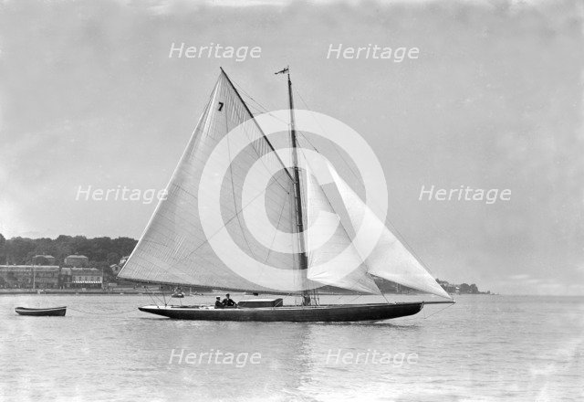 The cutter 'Eve' under sail, 1911. Creator: Kirk & Sons of Cowes.