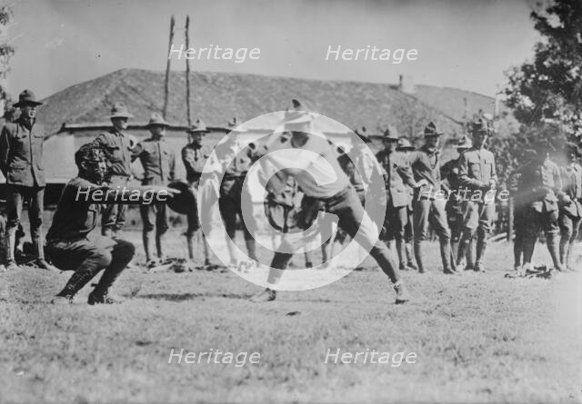 Y.M.C.A. hut in France, soldiers' ball game, 1917 or 1918. Creator: Bain News Service.