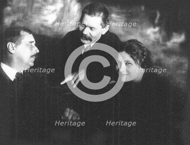 Moura Budberg with Herbert George Wells and Maxim Gorky in Petrograd, 1920. Artist: Anonymous  