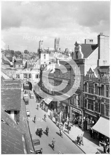High Street, Lincoln, Lincolnshire, early 1930s. Creator: J Dixon Scott.