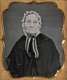 Elderly Woman Wearing Glasses and a Soft Bonnet, 1850s. Creator: Unknown.
