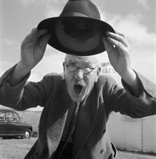 Livestock photographer Charlie Ward,  Blackpool, 1954. Artist: John Gay