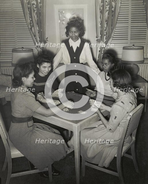 Government hotel for Negro women war workers; A group of young war worker..., 1942-1943. Creator: Roger Smith.
