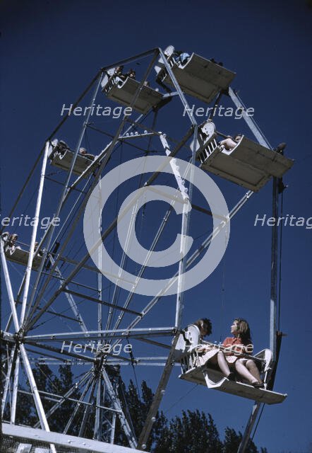 On the ferris wheel at the Vermont state fair, Rutland, 1941. Creator: Jack Delano.